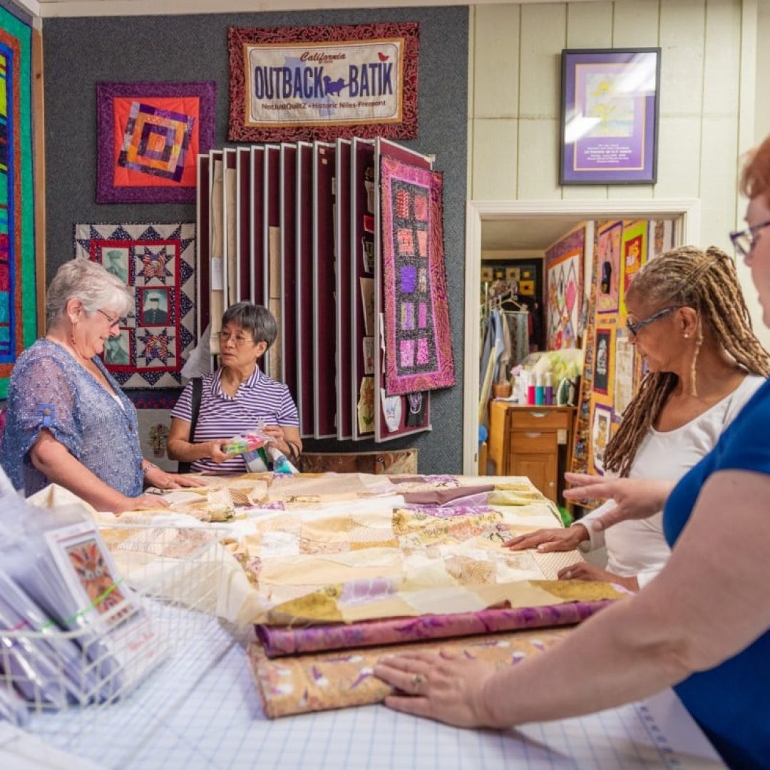 people quilting